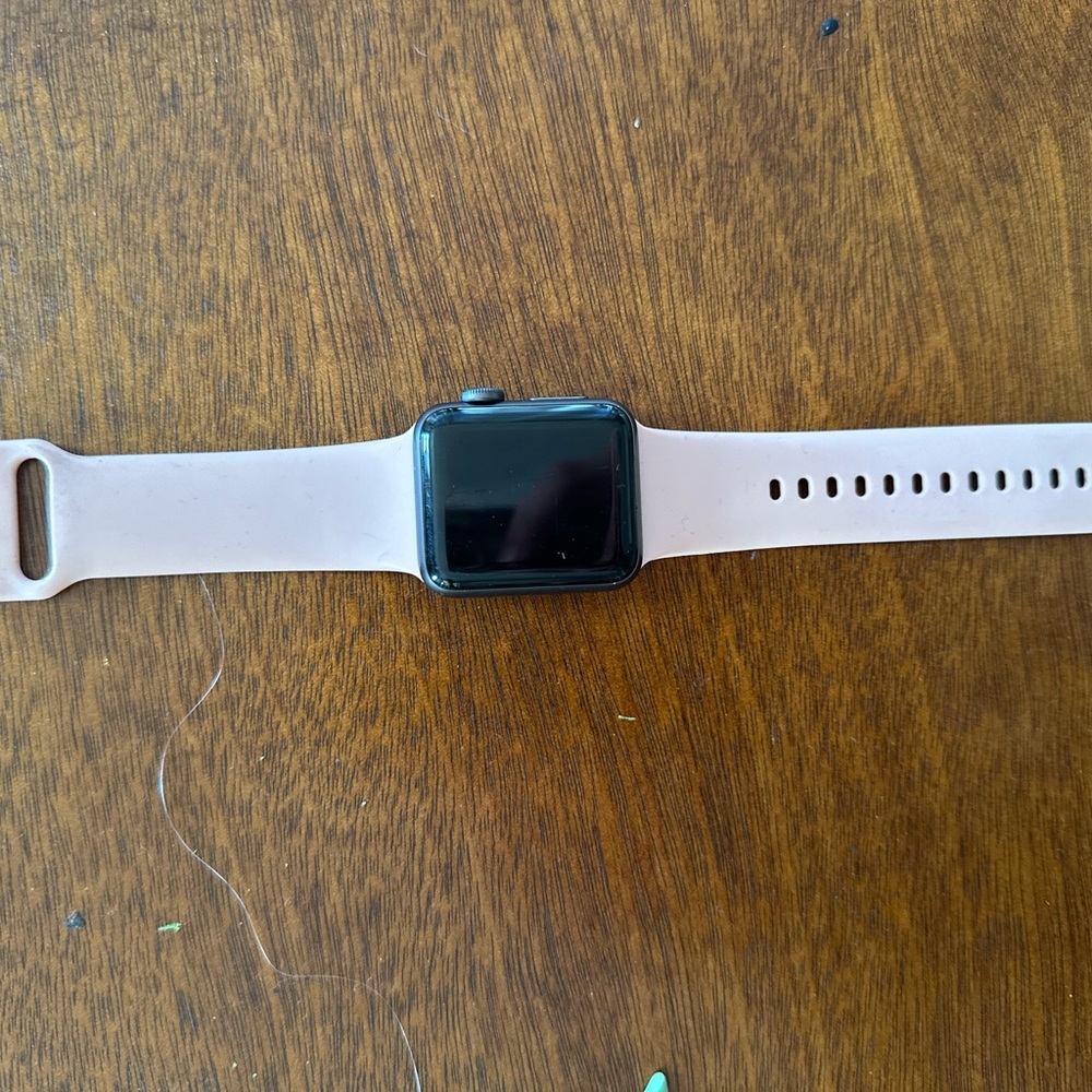 Smart Wearable with Black Display and Tan Band